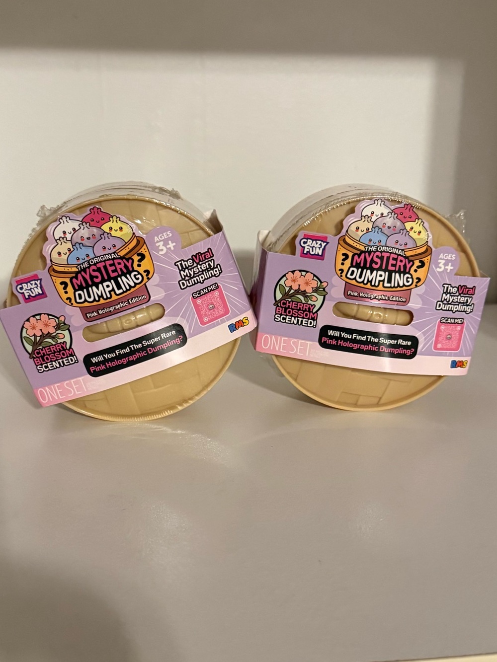 2 SEALED RMS cherry blossom scented dumplings.